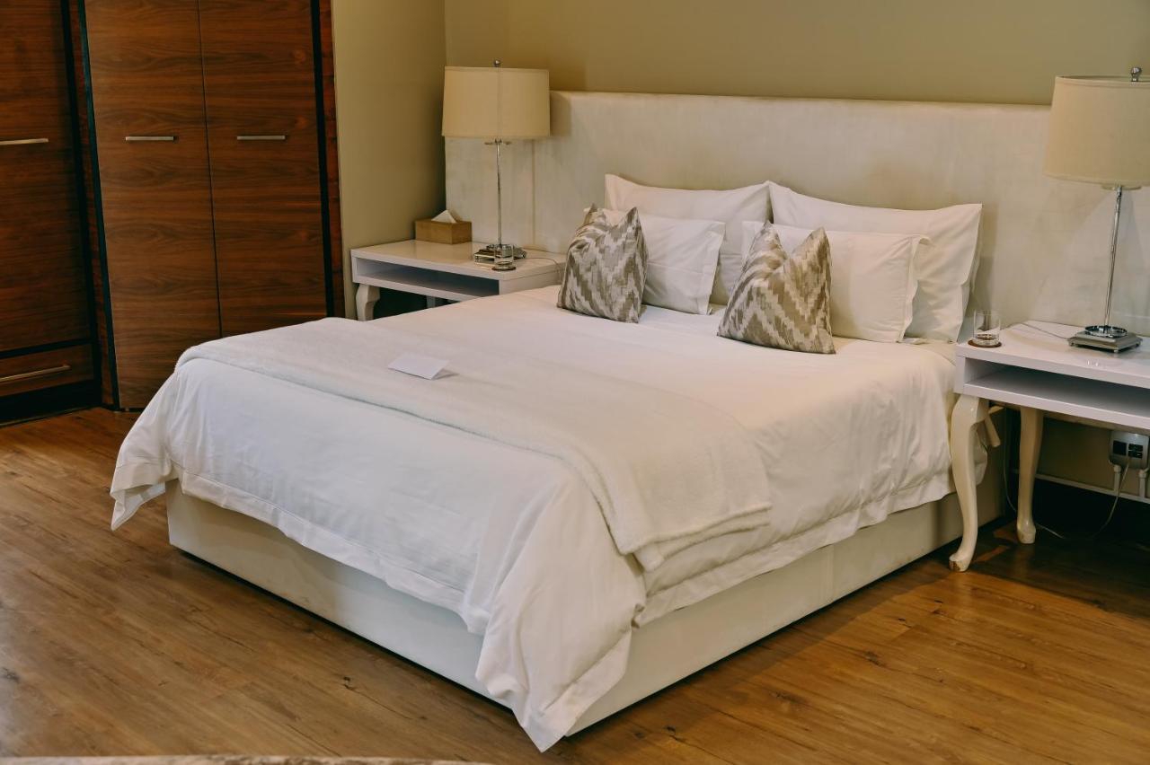 Tredenham Boutique Hotel Bloemfontein Exterior foto A bed