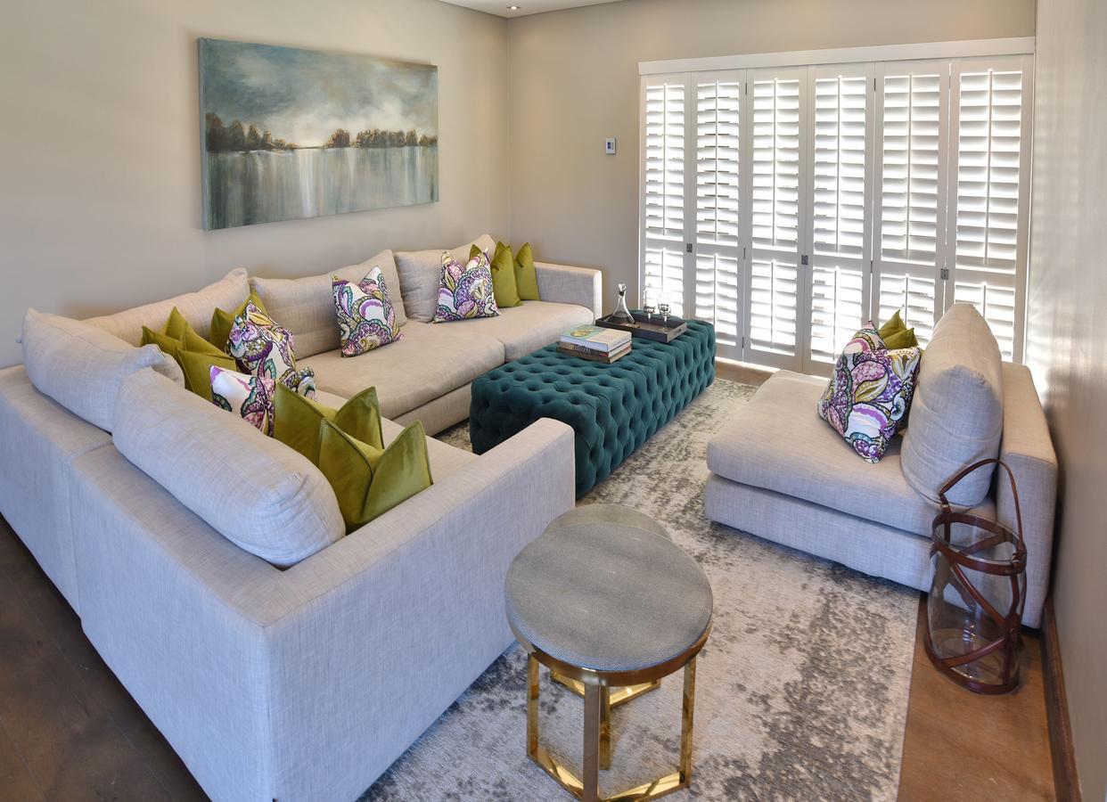 Tredenham Boutique Hotel Bloemfontein Exterior foto A living room with plantation shutters